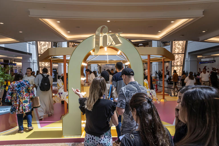 Crowds gather at Mall of the Emirates in Dubai for the launch of Fix Dessert Chocolatier's new mango flavoured bar. Antonie Robertson / The National