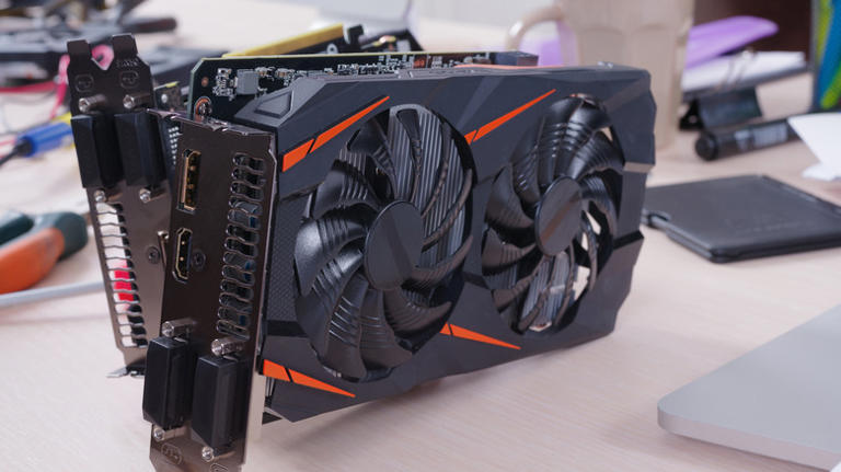 Graphics card with two fans on a workbench