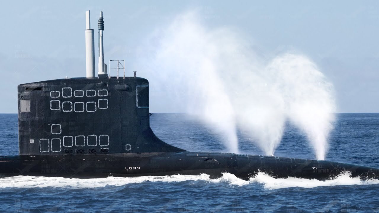 US submarine performs deep dive in the ocean resembling a whale
