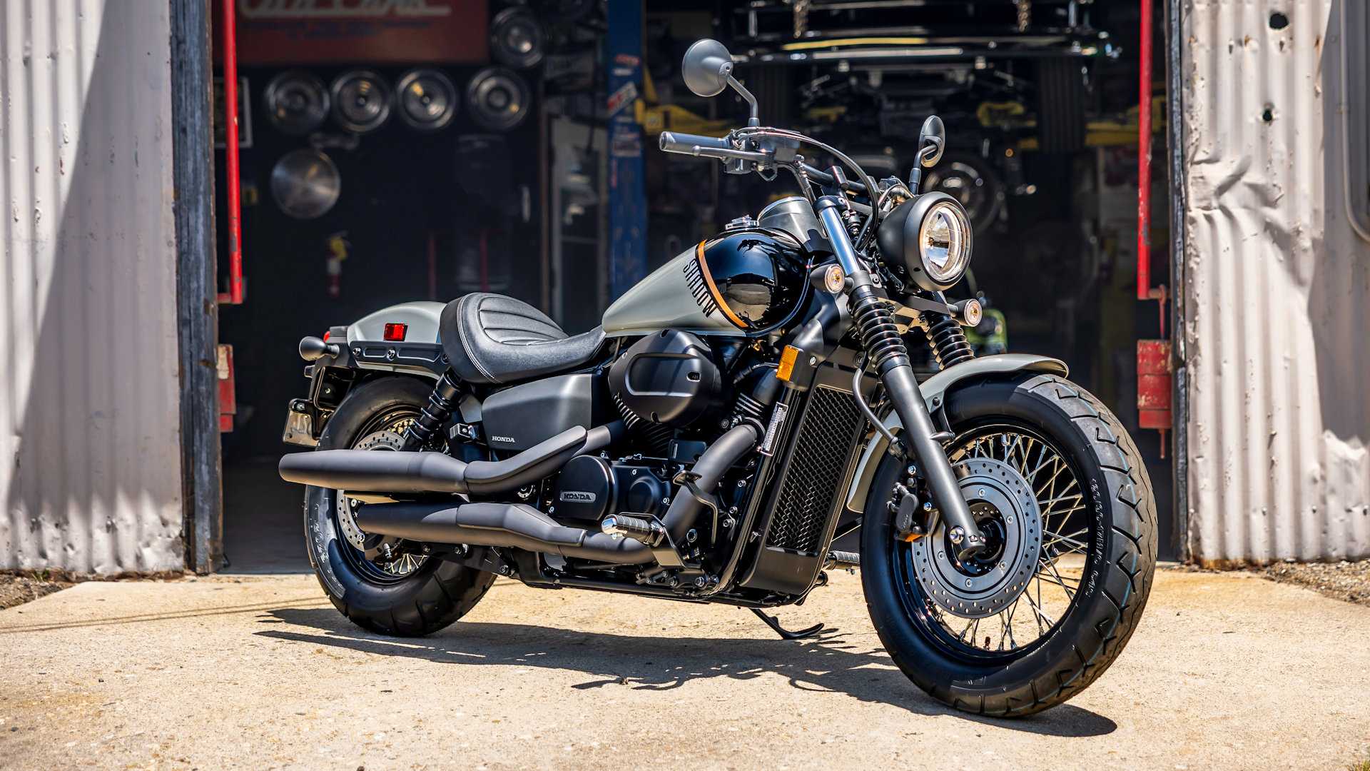 Honda Shadow Phantom parked outside a repair garage