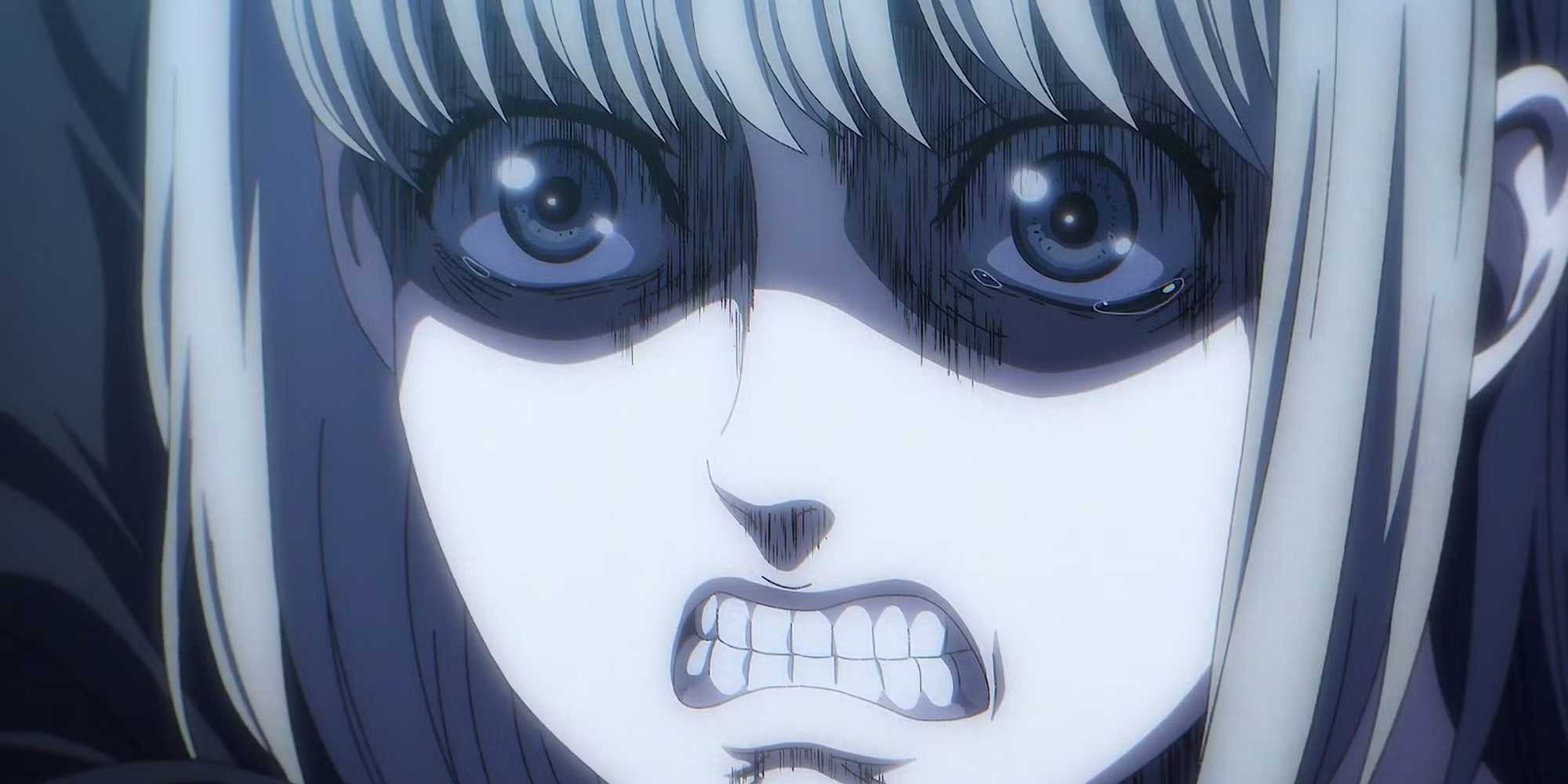 Ymir Fritz bares her teeth and cries.
