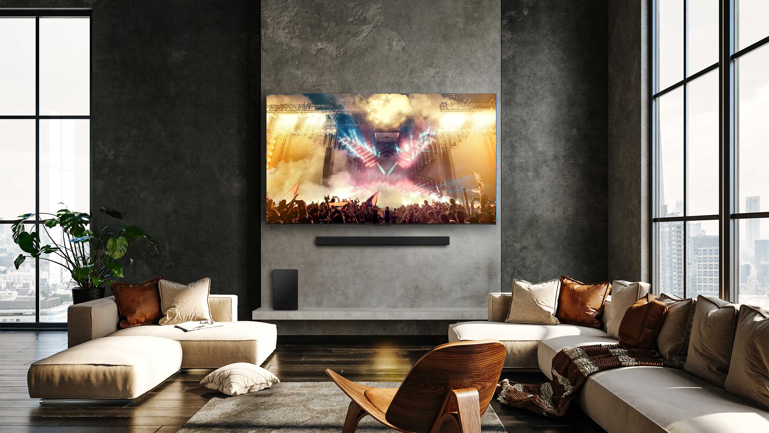 The TCL Q75H soundbar and subwoofer in a living room.