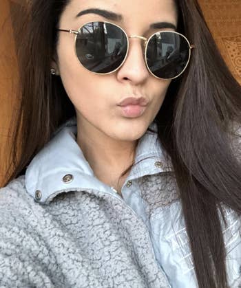 reviewer wearing the sunglasses