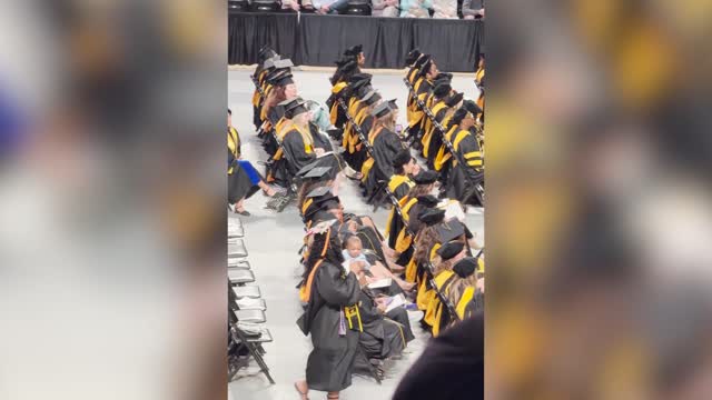 Mother gives birth during nursing school, walks baby across graduation ...