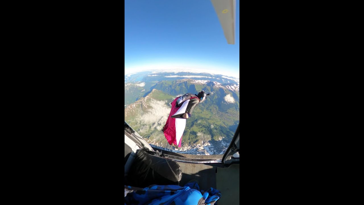 Wingsuit Base Jump From Helicopter
