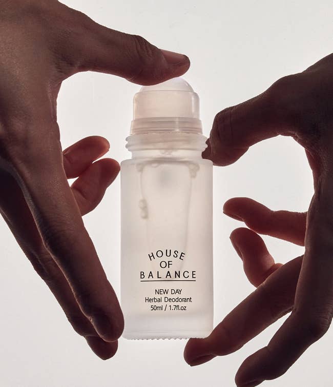 Hands holding a translucent