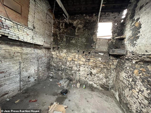 Terraced house goes on the market for just £1 000 but there #39 s a VERY