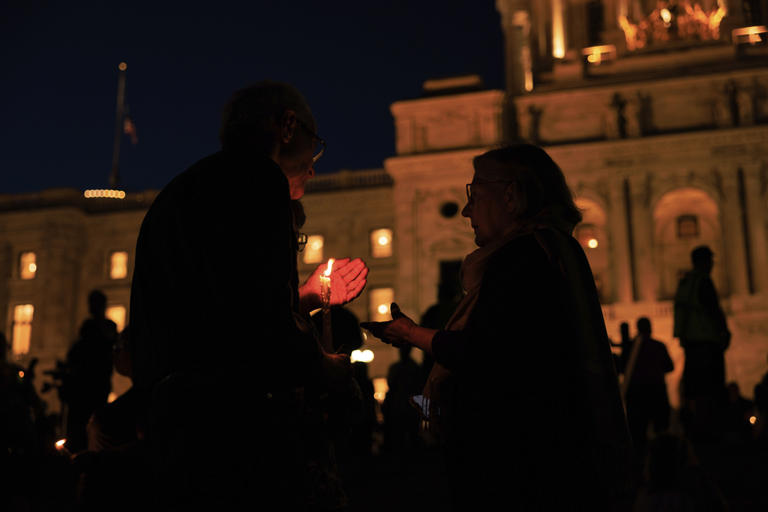 Photos of candlelight vigil honoring slain Minnesota lawmaker and her
