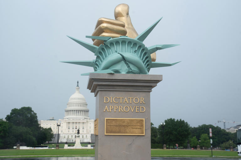 Eight-foot-tall 'Dictator Approved' sculpture appears on National Mall