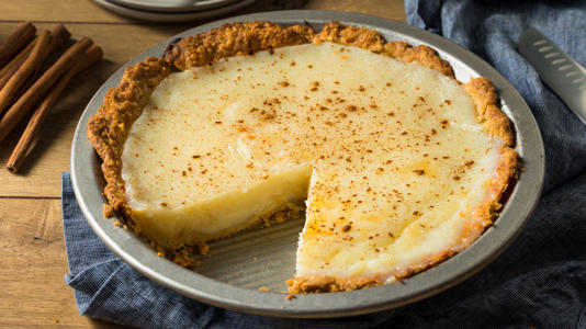 Sugar cream pie with slice removed