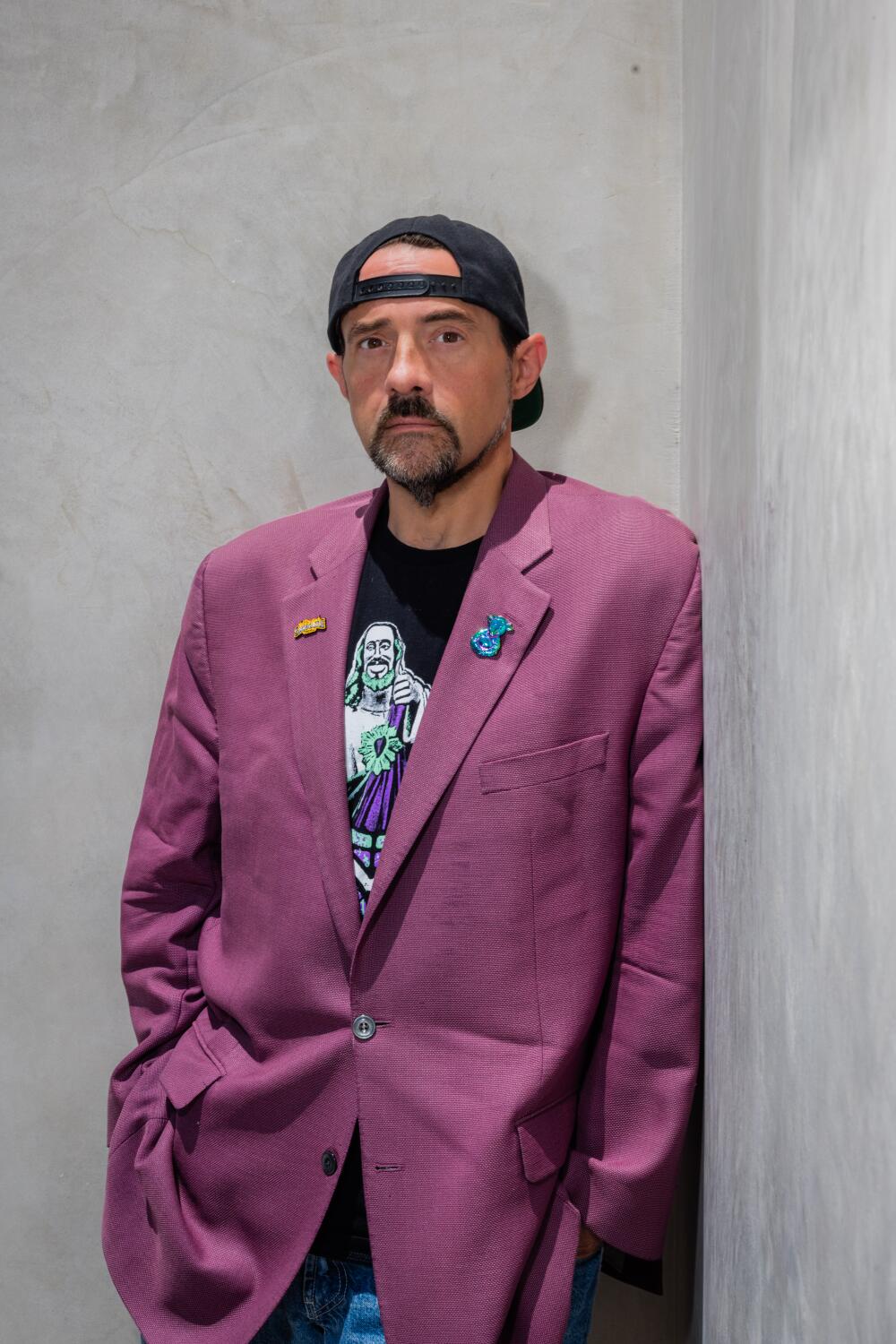 "To me, it plays like a kid really trying to celebrate his faith after having grown up in a church where every Sunday, everyone seemed to be mourning it. ... It's a love letter to spirituality," Kevin Smith said about "Dogma." ((Jason Armond / Los Angeles Times))