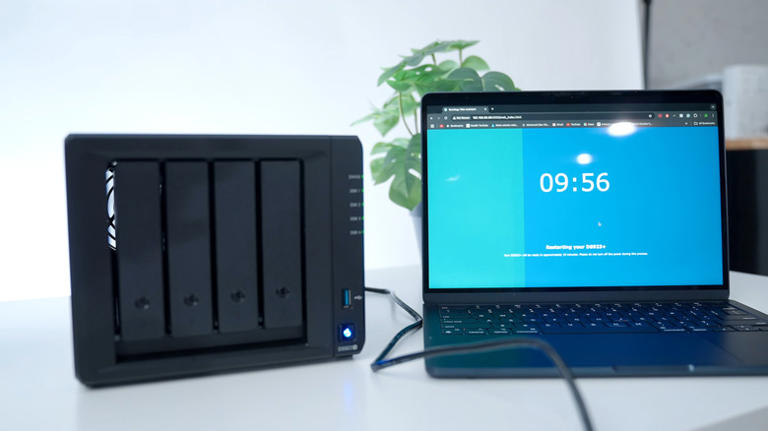 Laptop and NAS device on a table