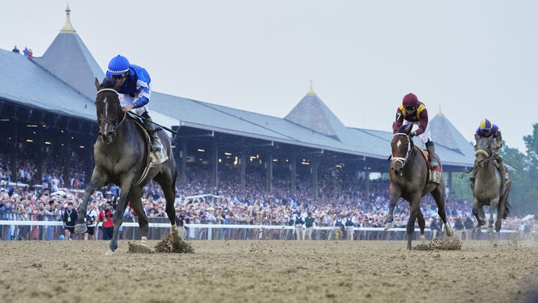 Sovereignty (2), with jockey Junior Alvarado up, crosses the finish line ahead of Journalism (7), with jockey Umberto Rispoli up, and Baeza (6), with jockey Flavien Prat up, to win the 157th running of the Belmont Stakes horse race, Saturday, June 7, 2025, in Saratoga Springs, N.Y. (AP Photo/Seth Wenig)