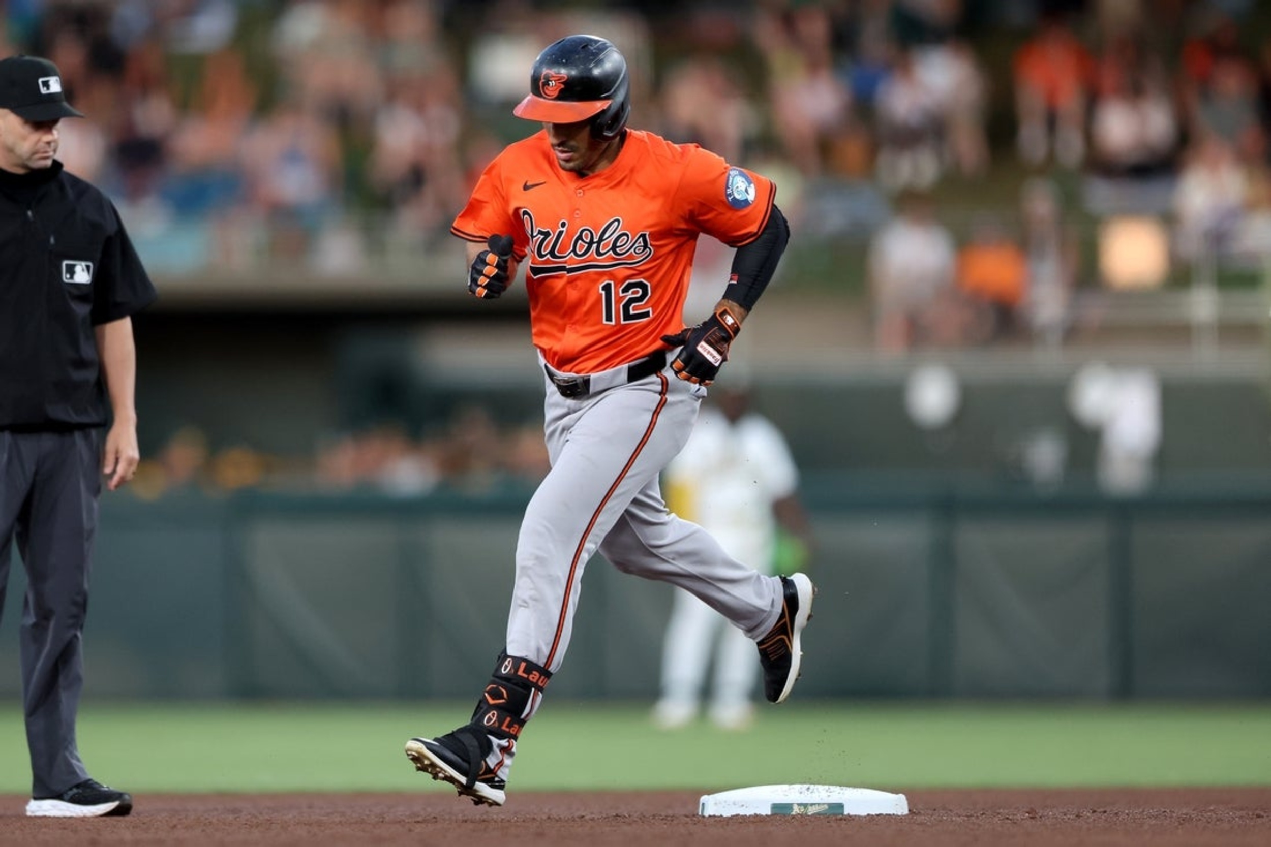 Orioles stay hot, power up to rally past Athletics