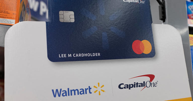 A Capital One Walmart credit card sign is seen at a store in Mountain View, California, United States on Tuesday, November 19, 2019.