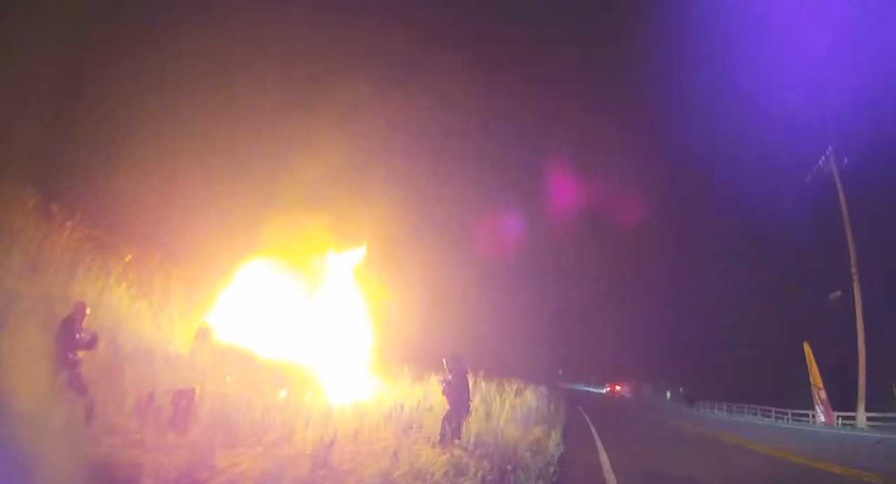 Cop, PassersBy Pull Woman From Burning Car After Fiery Orange County