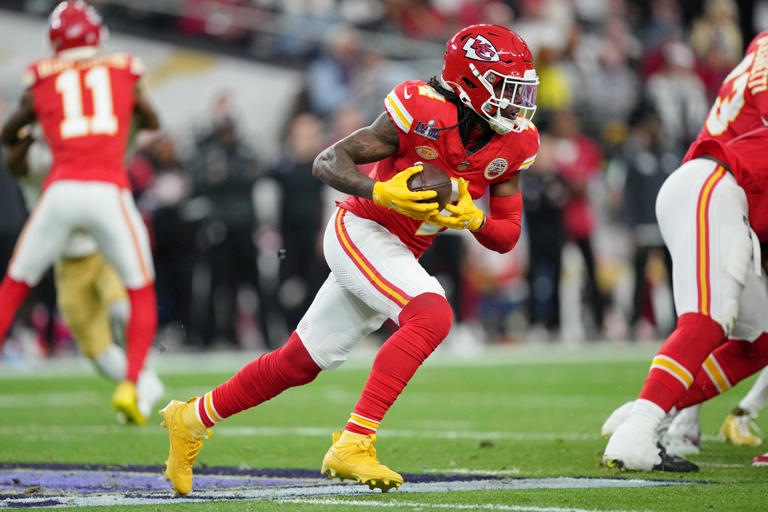 Feb 11, 2024; Paradise, Nevada, USA; Kansas City Chiefs wide receiver Rashee Rice (4) runs with the ball against the San Francisco 49ers during the second quarter of Super Bowl LVIII at Allegiant Stadium. Mandatory Credit: Kirby Lee-USA TODAY Sports