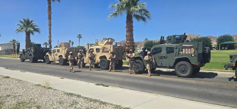 Marines stand near vehicles as they prepare to depart for Los Angeles, at an unknown location, in this handout picture released on June 9, 2025. U.S. Northern Command via X/Handout via REUTERS  THIS IMAGE HAS BEEN SUPPLIED BY A THIRD PARTY. NO RESALES. NO ARCHIVES. MANDATORY CREDIT