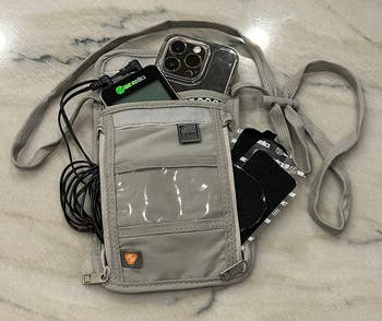 reviewer's pouch with tons of stuff inside