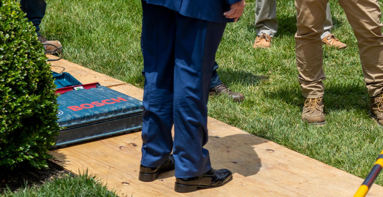 The zoomed image of Trump’s legs, which users have been sharing on social media and speculating that he could be wearing a leg brace. There is no proof that suggests this is the case (EPA)