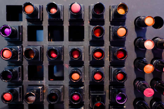 used Lipstick on display shelf, Cosmetics tester