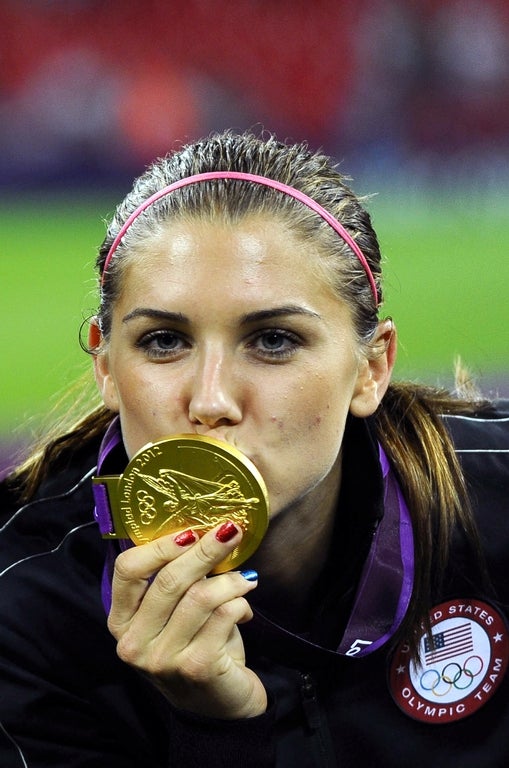 Female athletes who won an Olympic gold medal and pro championship, in