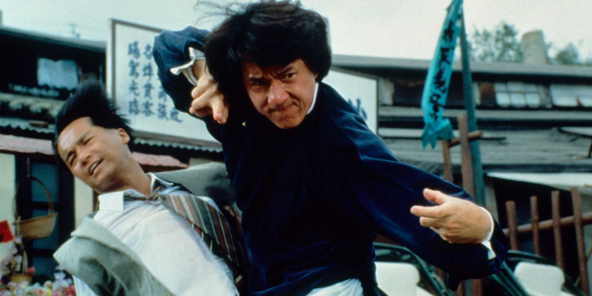 Wong Fei Hung (Jackie Chan) has taken out an opponent in The Legend of the Drunken Master.