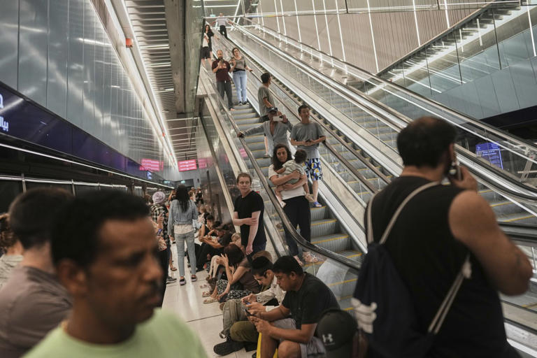 Fearful of Iranian missiles, many sleep in Israel's underground train