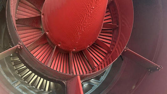 The back of one of the engines covered in paint