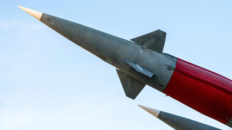 Rocket shell ready to launch. Dangerous weapons of mass destruction of enemies of the country. Image: Shutterstock / travelarium.ph.