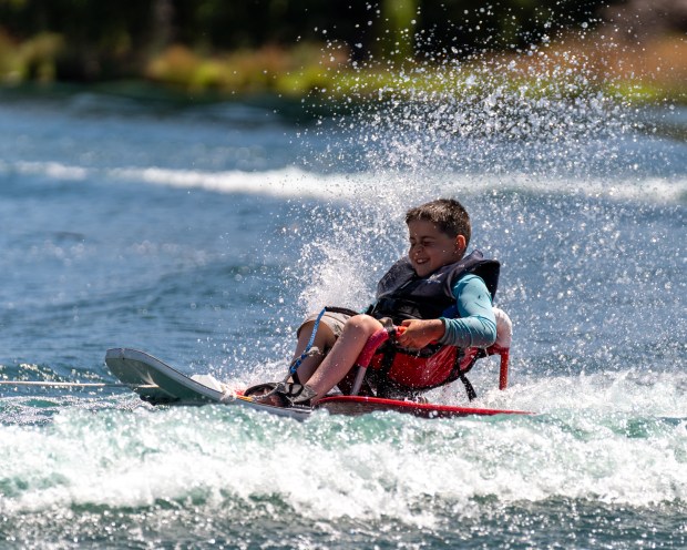 AA1H99Ex Bridging the Gap: Ability First Sports Camp Empowers Campers to Build Families