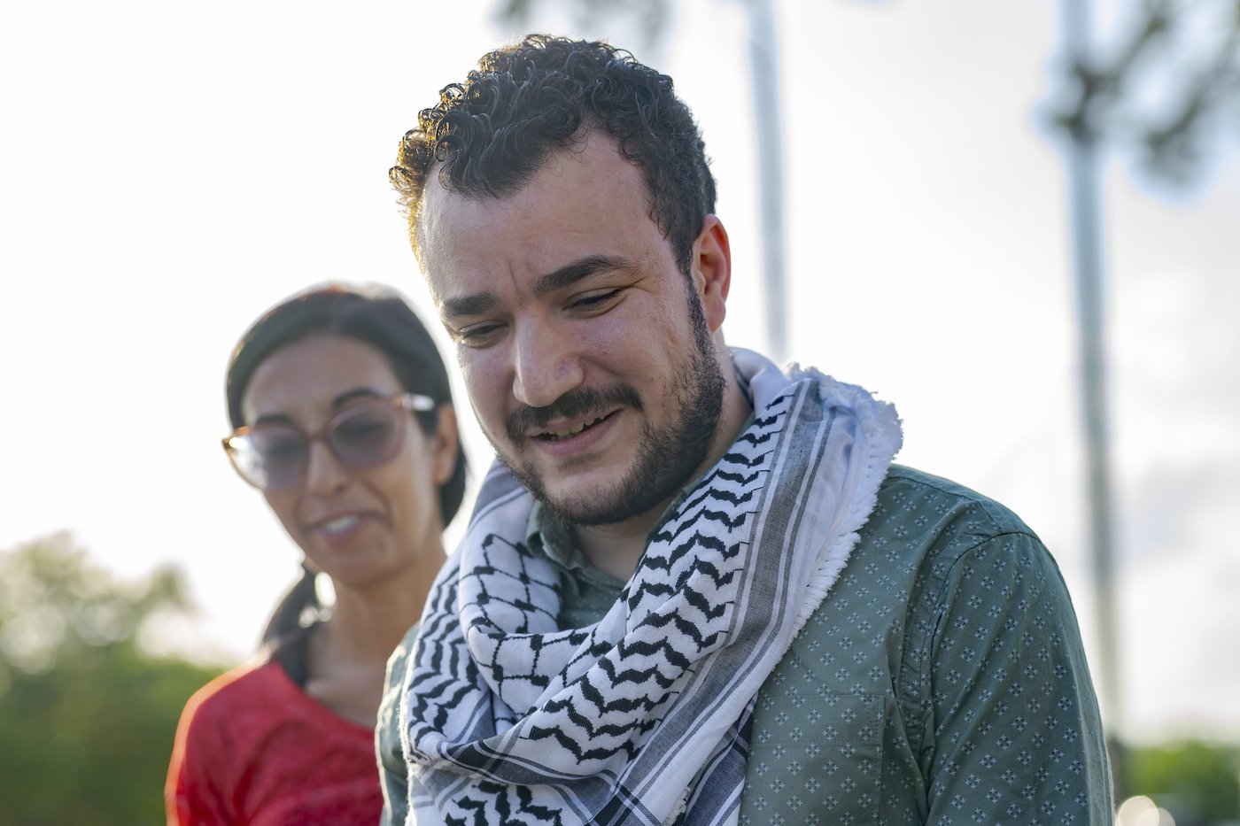 Palestinian activist and former Columbia University graduate student Mahmoud Khalil, center, speaks after his release from federal immigration detention in Jena, La., Friday, June 20, 2025. (AP Photo/Matthew Hinton)