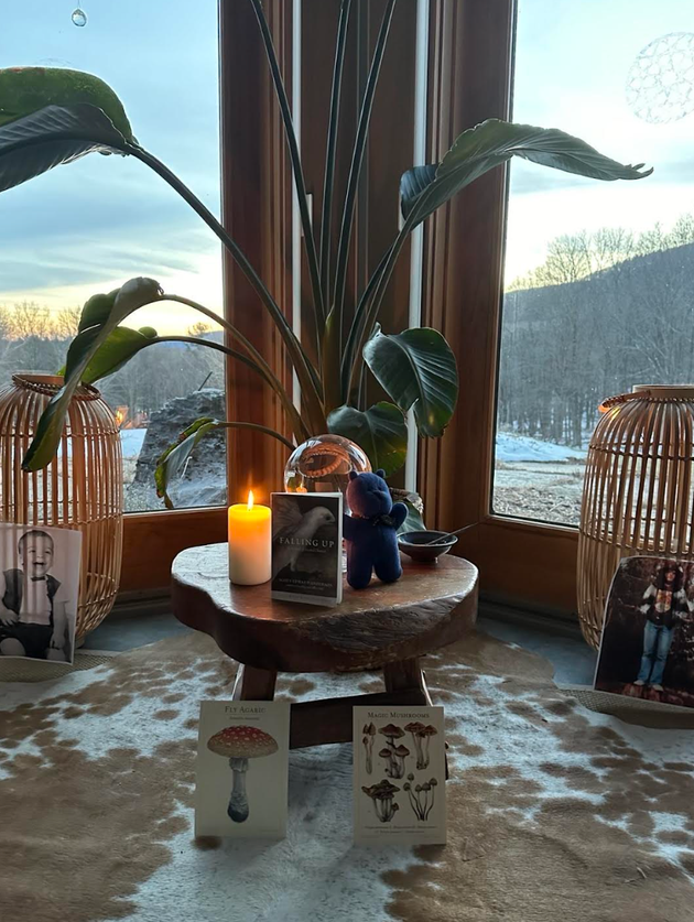 The makeshift “altar” featuring the author's photos, one of his books and other symbolic items.