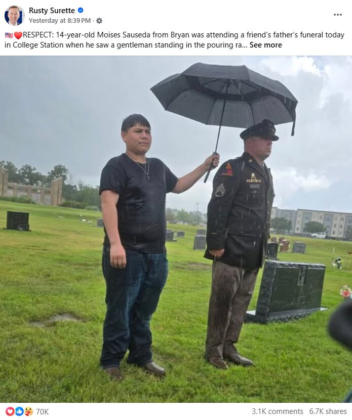 A boy, a soldier and a storm: Photo of silent respect moves thousands