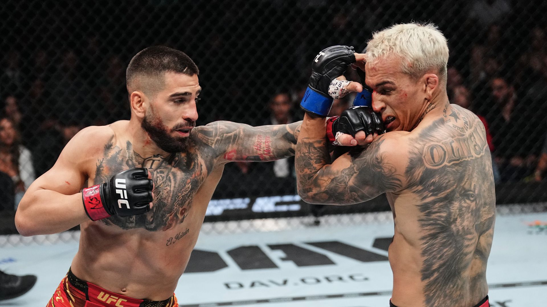 Ilia Topuria sleeps Charles Oliveira with brutal knockout, nearly