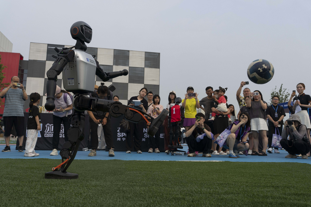 Photos show how humanoid robots captivate fans in China by ...