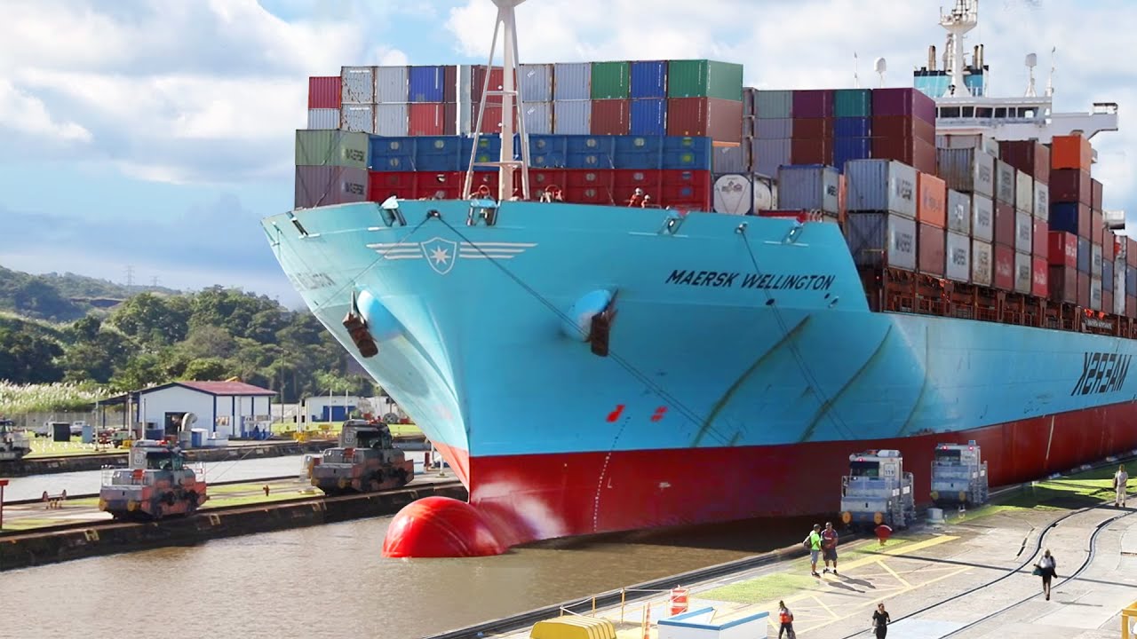 Gigantic Container Ship Navigates Super Tight Panama Canal.