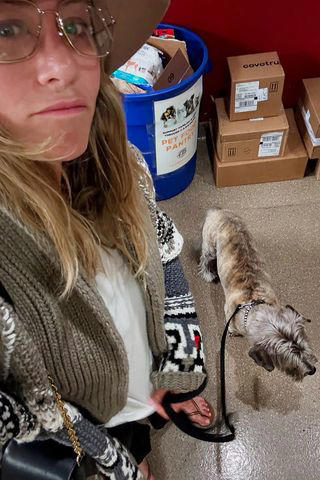 Jennifer Aniston/Instagram Jennifer Aniston with her dog Clyde