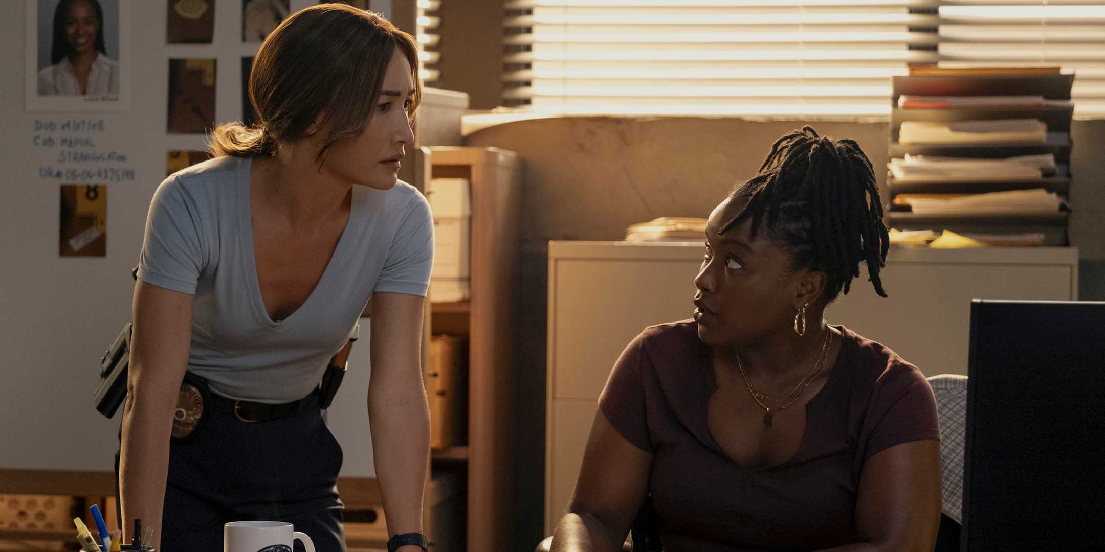 Maggie Q's Renée looking in thought and Courtney Taylor's Samira looking intrigued in Ballard