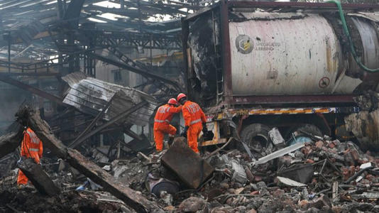 National Disaster Response Force rescuers work at the site after an explosion and fire at a chemical factory in Dombivali near Mumbai, India, Friday, May 24, 2024.
