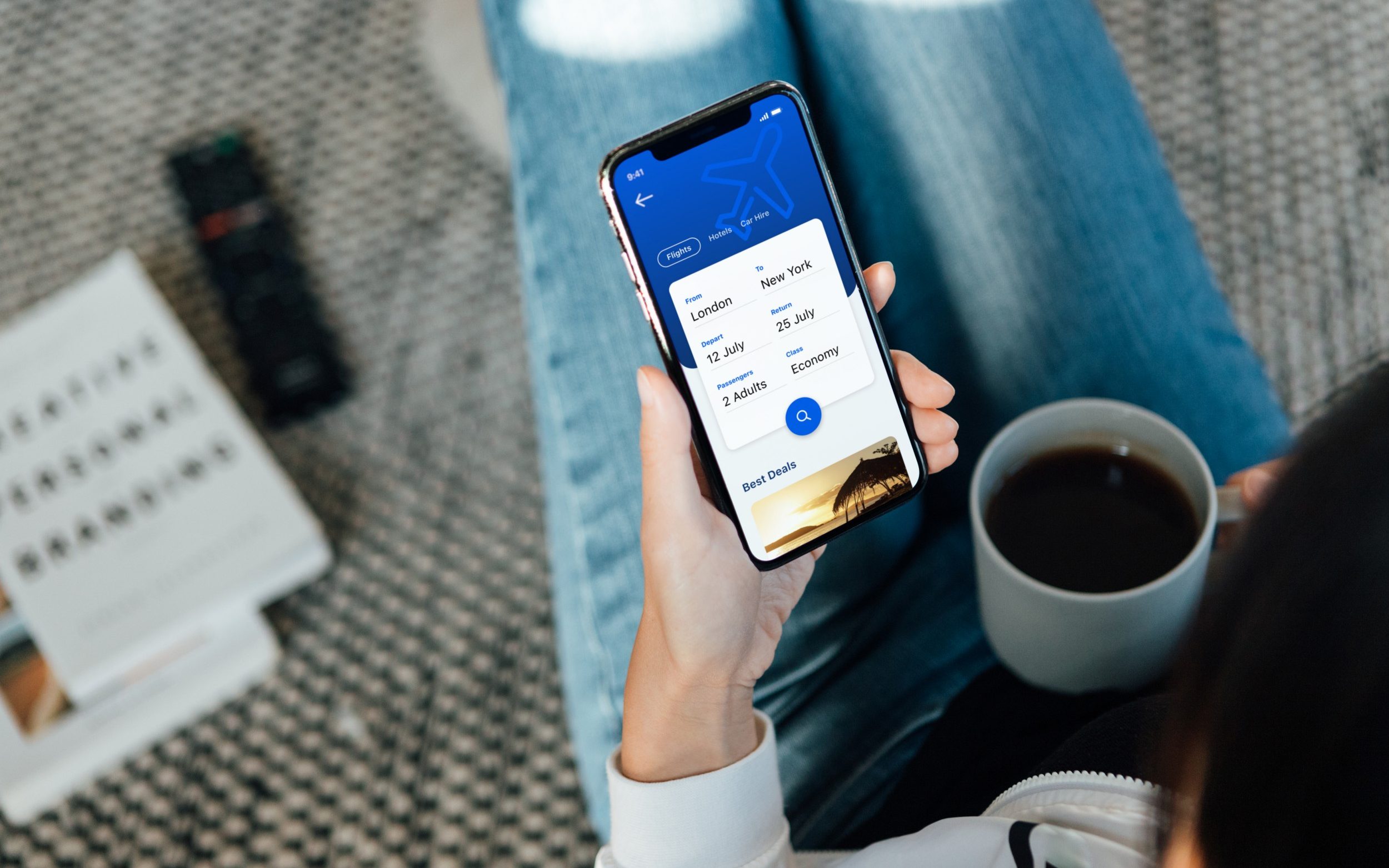 Woman using smartphone to book flight tickets and plan holiday