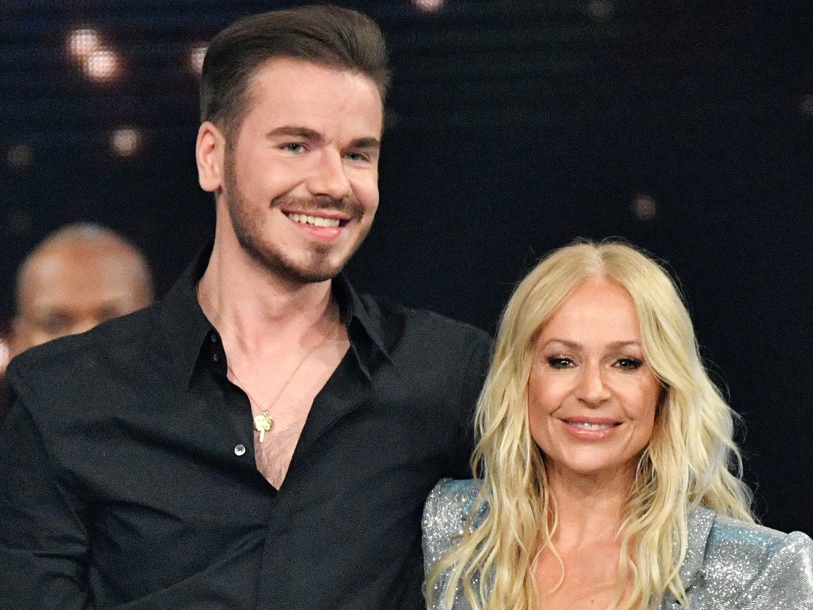 Singer Michelle and Eric Philippi have been "together for much longer"