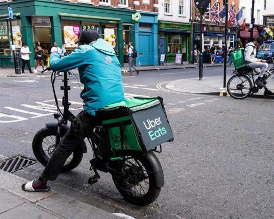Uber Eats, Deliveroo and Just Eat have promised to increase the use of facial verification checks for riders. Photograph: Antonio Olmos/The Observer