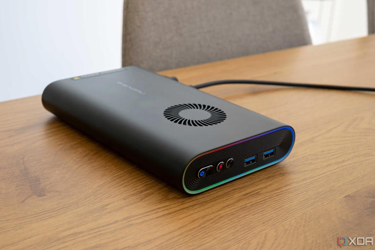 Angled view of the OneXGPU showing the RGHB lghting USB ports, and power button