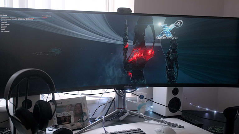 X4_ Foundations on a 49-inch monitor