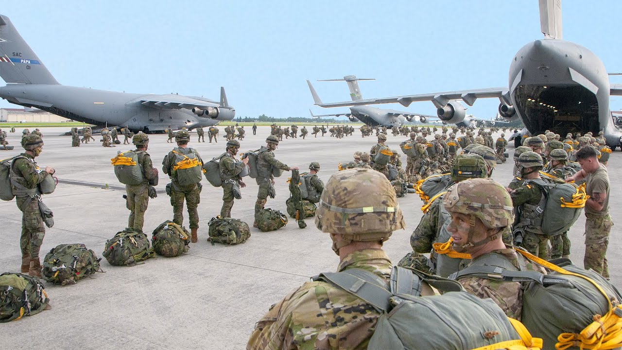 Paratroopers conduct massive static line jump from C-17 & C-130