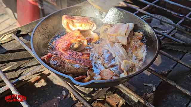 Wood duck breast wrapped in bacon on cast iron