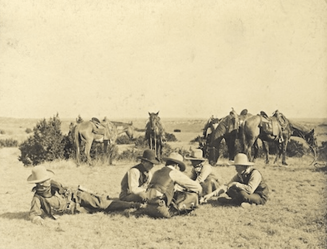 Cowboys playing Mumble-Peg on the Turkey Track Ranch, 1906