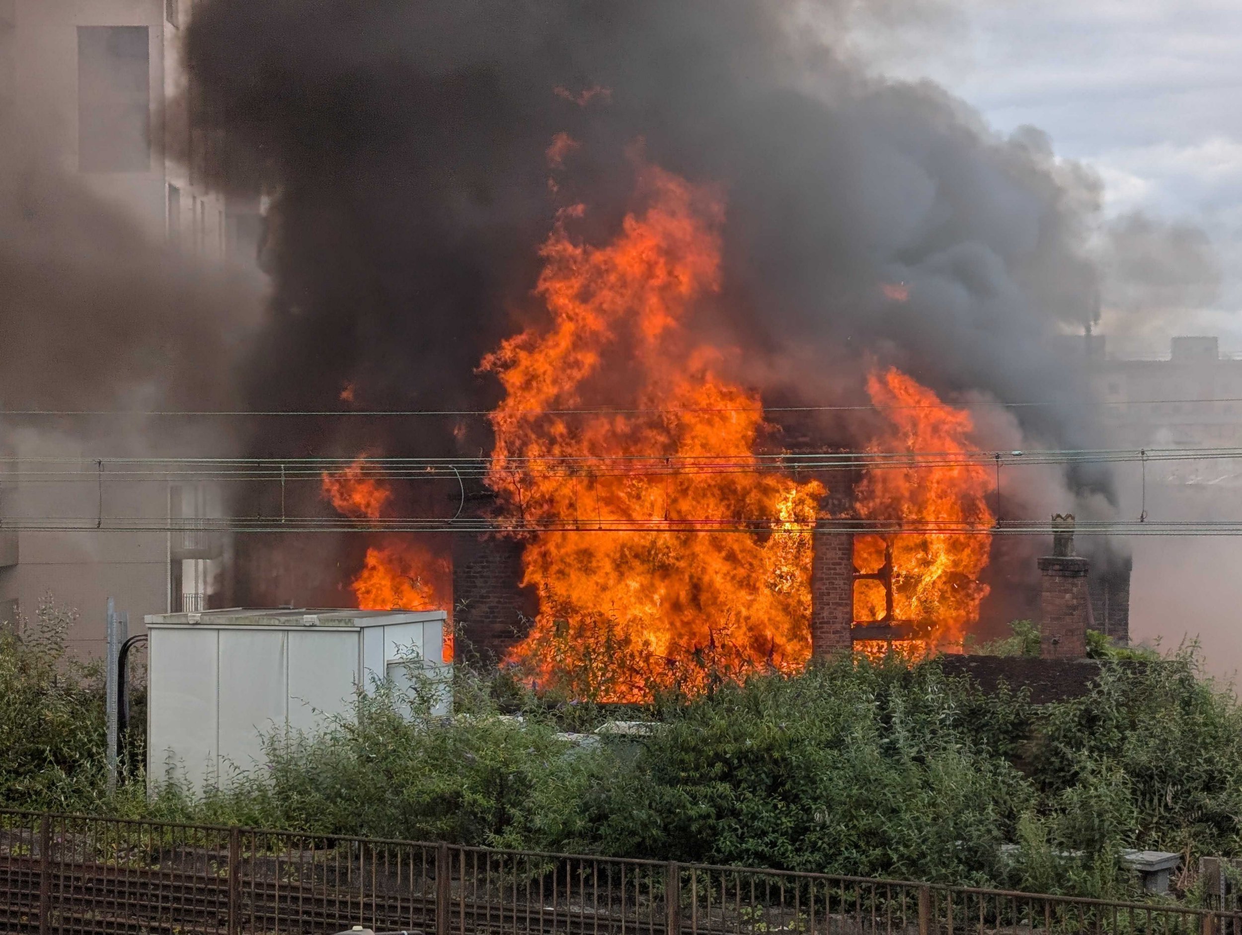 Huge fire in Manchester forces evacuations and delays