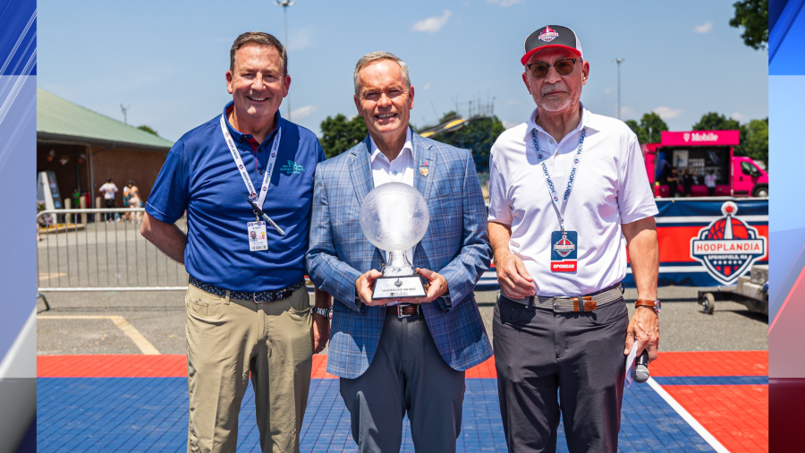 Hall of Fame CEO John Doleva honored with leadership award at Hooplandia